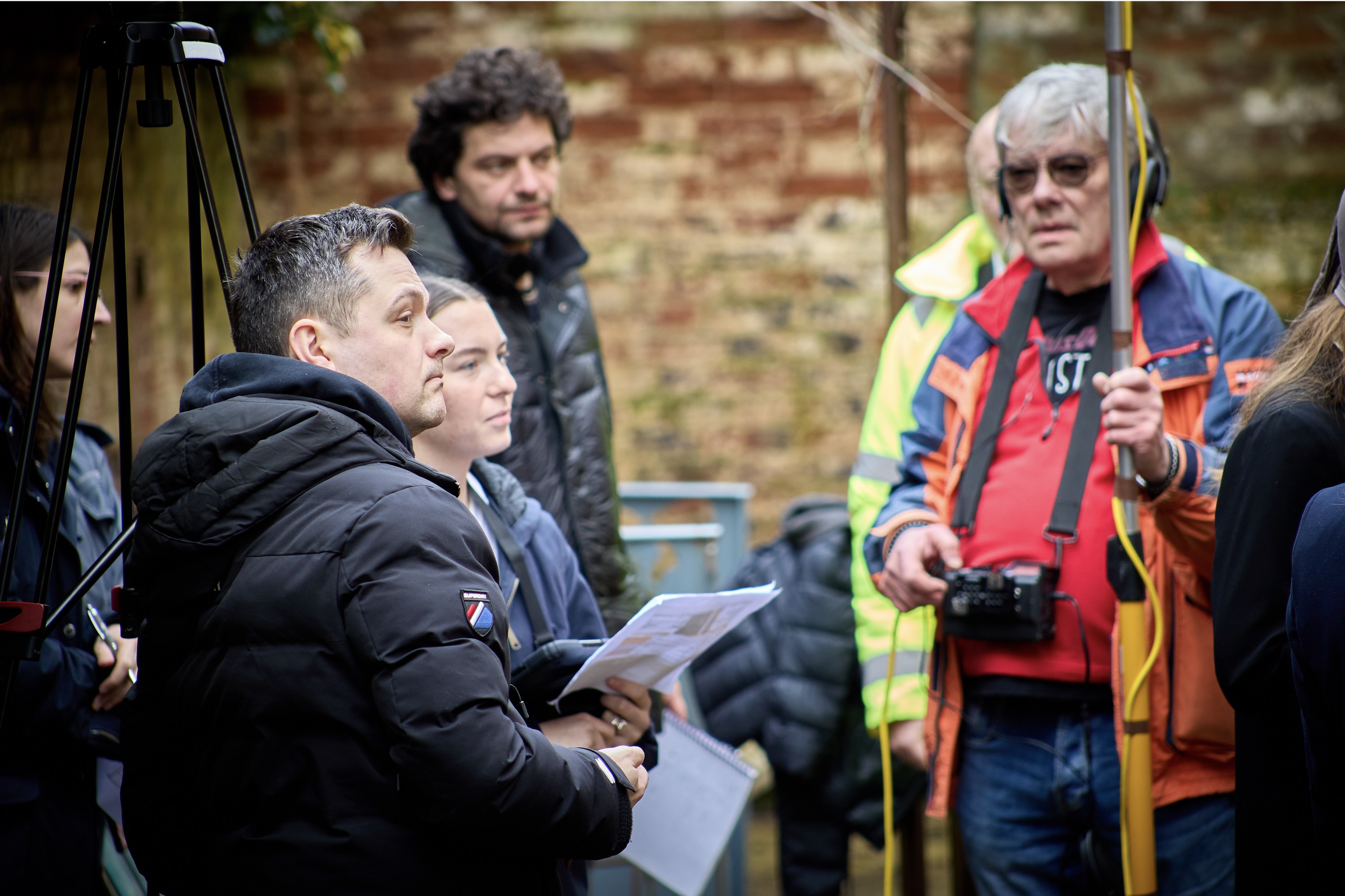 purple lighting and a croud of people